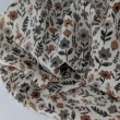 Cotton muslin, caramel and gray flowers on an ecru background