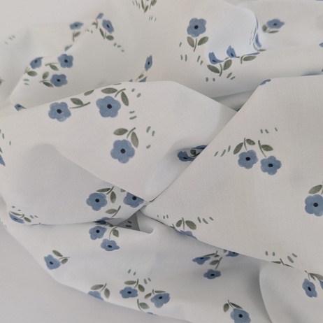 100% cotton poplin, blue flowers on white background