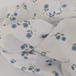 100% cotton poplin, blue flowers on white background
