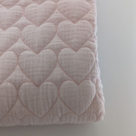Quilted pink muslin with heart pattern – double-sided with wadding
