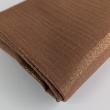 Double gauze 100% cotton shiny, golden particles on a caramel background