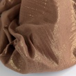 Double gauze 100% cotton shiny, golden particles on a caramel background