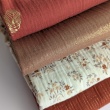 Double gauze 100% cotton shiny, golden particles on a caramel background