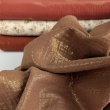 Double gauze 100% cotton shiny, golden particles on a caramel background