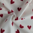 Cotton flannel, red hearts on a cream background, 165 g/m²