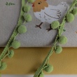 Green ribbon with pom poms - double thread.