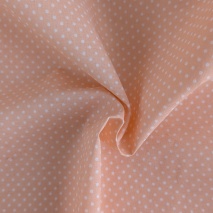 Cotton 100% white 2mm polka dots on a light orange background