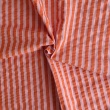 Seersucker orange-pink stripes