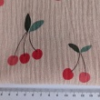 Cotton muslin, cherries on a pink-beige background