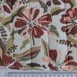 Quilted muslin, flowers/leopard print on an olive background