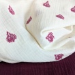 Cotton muslin, embroidered, burgundy ornament on a cream background