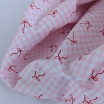 Waterproof fabric, Oxford, bows on a pink checkered background