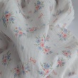 Organic cotton muslin, bows, bouquets on an ecru background