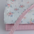 Organic cotton muslin, bows, bouquets on an ecru background