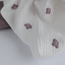 Cotton muslin, embroidered, heather flowers on an ecru background