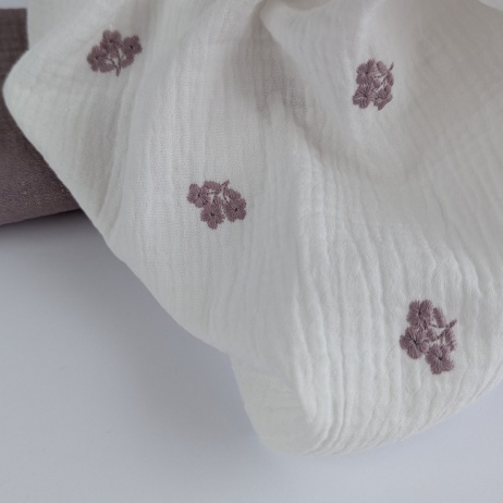 Cotton muslin, embroidered, heather flowers on an ecru background