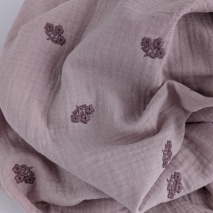 Cotton muslin, embroidered, heather flowers on a dusty heather background.