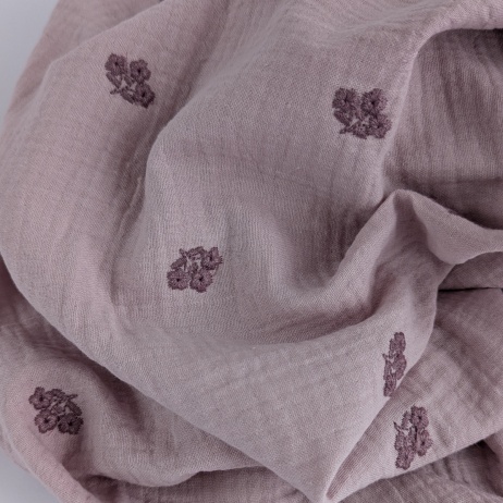 Cotton muslin, embroidered, heather flowers on a dusty heather background.