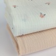 Cotton muslin, embroidered, salmon flowers on a cream background
