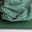 Cotton 100% white meadow on a dark green background, small flowers