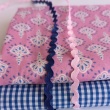 Cotton batiste fabric with ornament on a pink background
