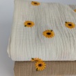 Cotton muslin, embroidered sunflowers on a natural background