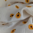 Cotton muslin, embroidered sunflowers on a natural background