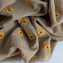 Cotton muslin, embroidered sunflowers on a beige background
