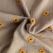 Cotton muslin, embroidered sunflowers on a beige background