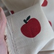 100% cotton, babycord, apples on a beige background