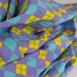 Single jersey, purple and yellow argyle pattern