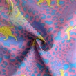 Cotton batiste fabric with leopard on a pink background