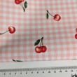Waterproof fabric, Oxford, cherries on a salmon checkered background