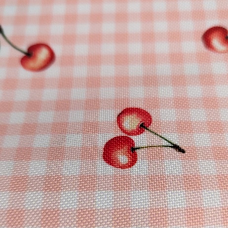 Waterproof fabric, Oxford, cherries on a salmon checkered background