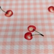 Waterproof fabric, Oxford, cherries on a salmon checkered background
