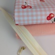 Waterproof fabric, Oxford, cherries on a salmon checkered background