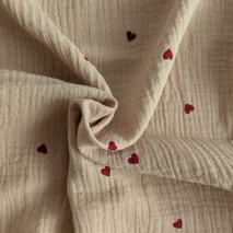 Double gauze 100% cotton, red hearts on a beige background