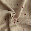 Double gauze 100% cotton, red hearts on a beige background