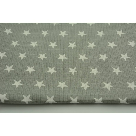Bamboo muslin in creamy star 2cm on a gray background