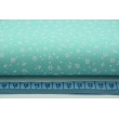Cotton 100% white meadow on a turquoise background, small flowers