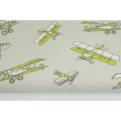 Cotton 100% green planes on a light gray background